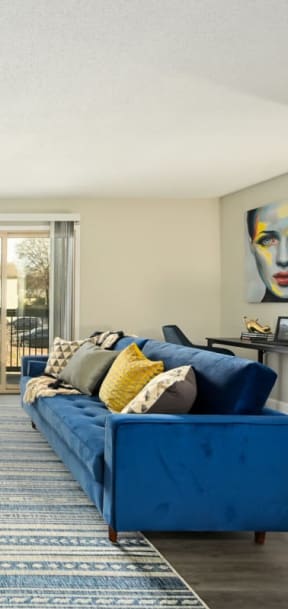 Living room with blue sofa