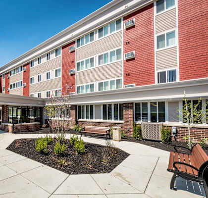 Courtyard Apartments_Building Exterior Sitting Area_Main