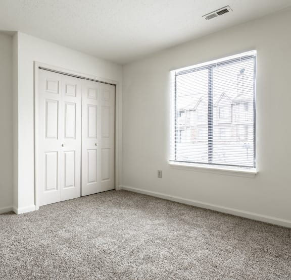 a bedroom with carpet at Pheasant Run in Lafayette, IN 47909