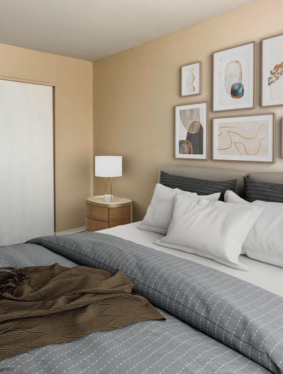 carpeted bedroom with closet and bed