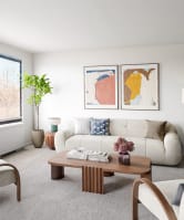 a living room with a couch and a coffee table