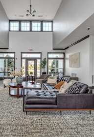 a living room with a couch and a fireplace