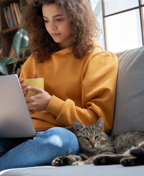 stock photo happy couple with a dog in their new home