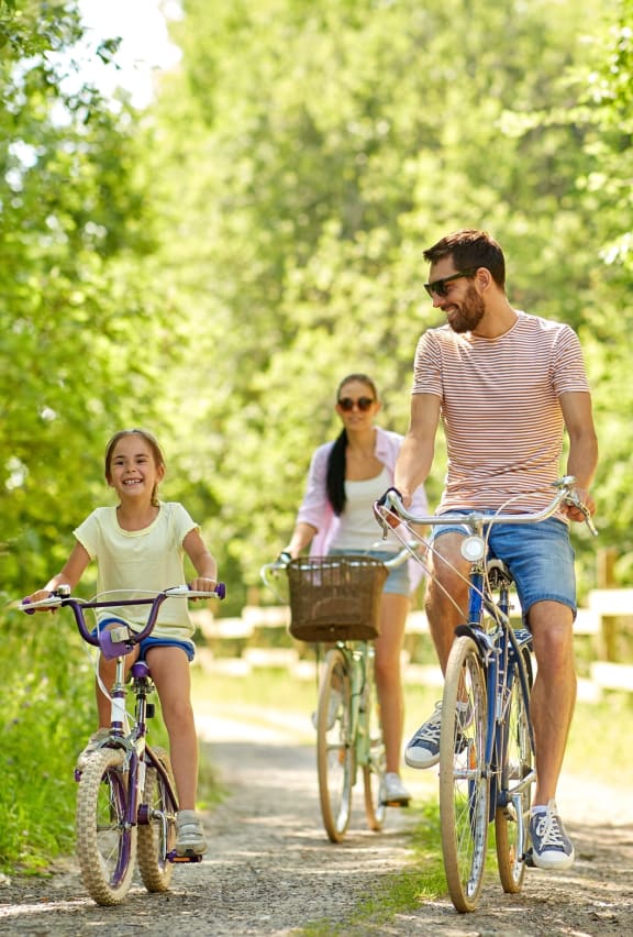 family on bikes at Edmonds Gateway in Edmonds, WA