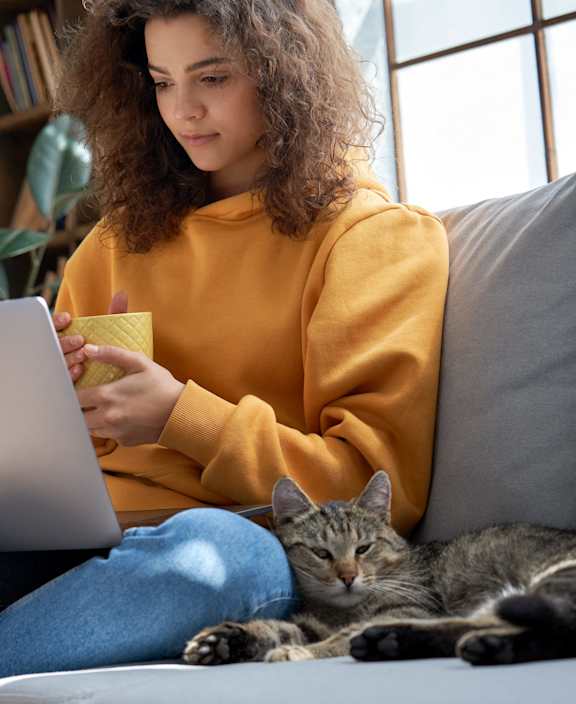 stock photo happy couple with a dog in their new home