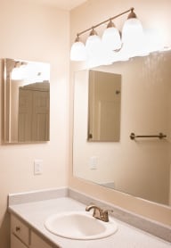 Bathroom With Vanity Lights at Wingsong Manor Apartments, Portland, OR 97215