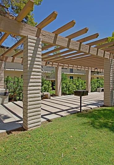 a covered patio with a pergola
