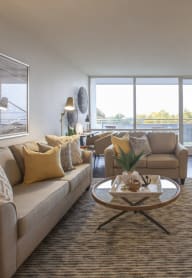 a living room with a couch and a table