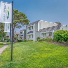 a house with a yard and a sign in front of it at Napa Green Apartments LLC, Napa