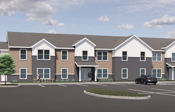 A rendering of a modern apartment complex with a parking lot in front.