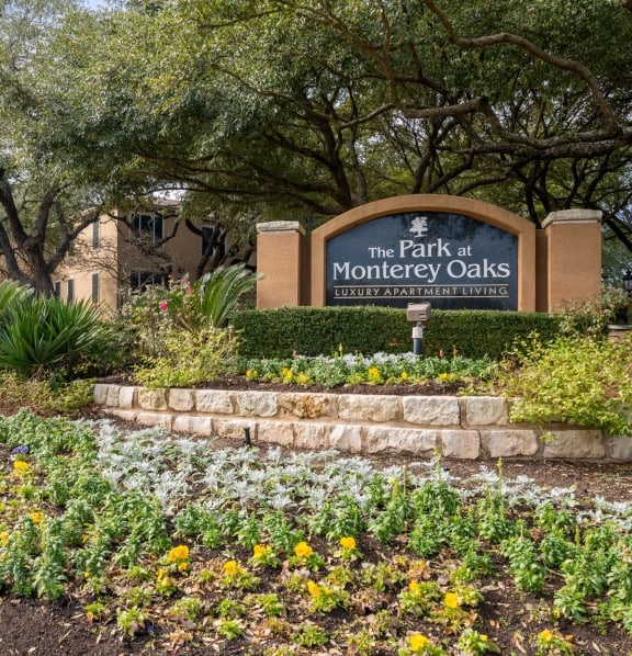 Welcoming community signage at The Park at Monterey Oaks, Austin, TX
