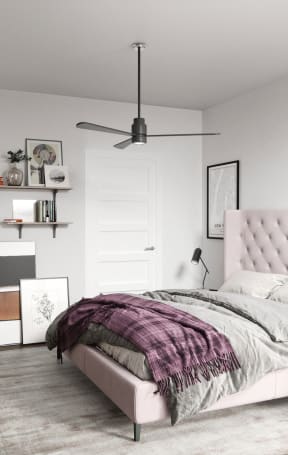 a bedroom with white walls and a pink bed