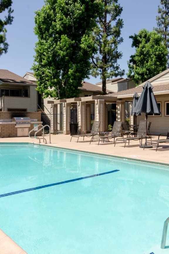 a swimming pool in front of an apartment building at Aspire Rialto, California, 92376