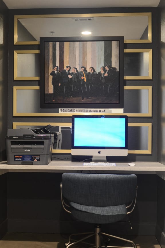 a kitchen with wooden cabinets and a black microwave