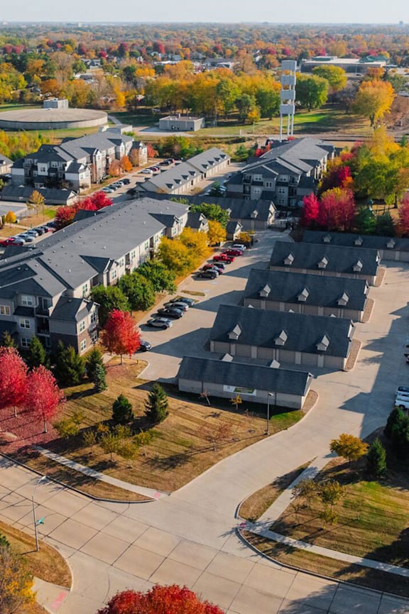 A suburban area with a mix of residential and commercial buildings. at Stonegate Crossing Apartments, IOWA, 50325