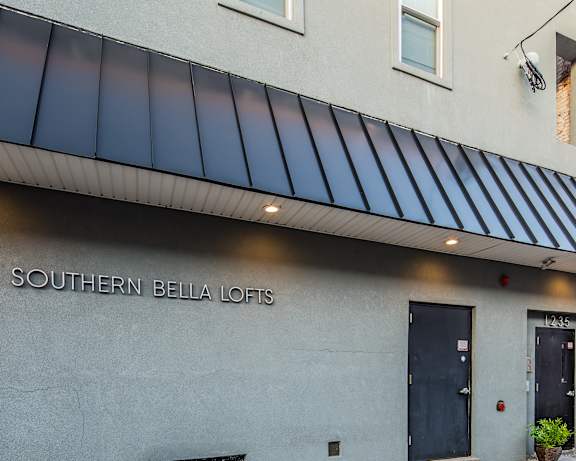 The image shows the front of a building with the name "SOUTHERN BELLA LOFI" on its facade.