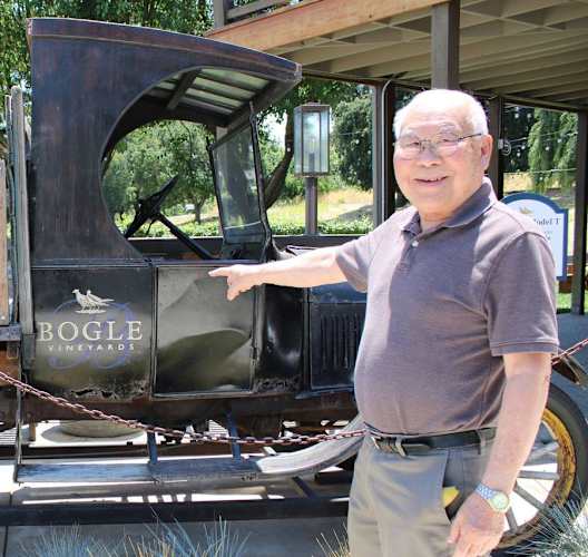 a man standing in front of an old truck at Campus Commons Senior Living, Sacramento, CA 95825