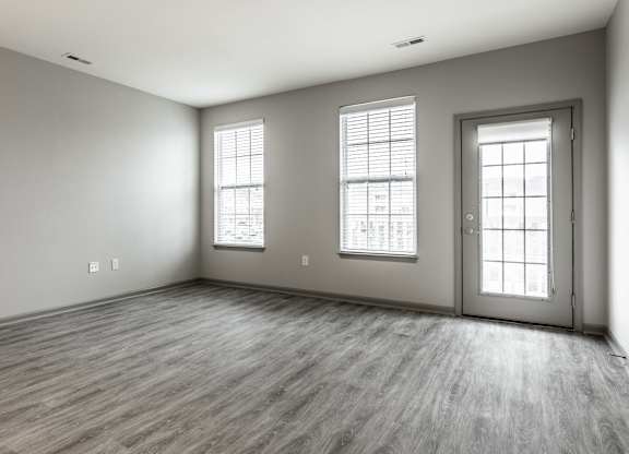 Empty living room at Bella Vista Apartments in Fishers, IN 46038