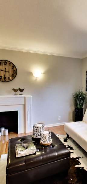 a kitchen with white appliances and wooden cabinets