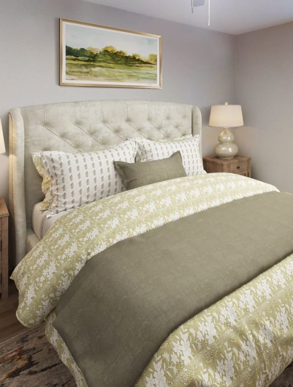 a bedroom with a bed and a ceiling fan at The Frederick, Texas