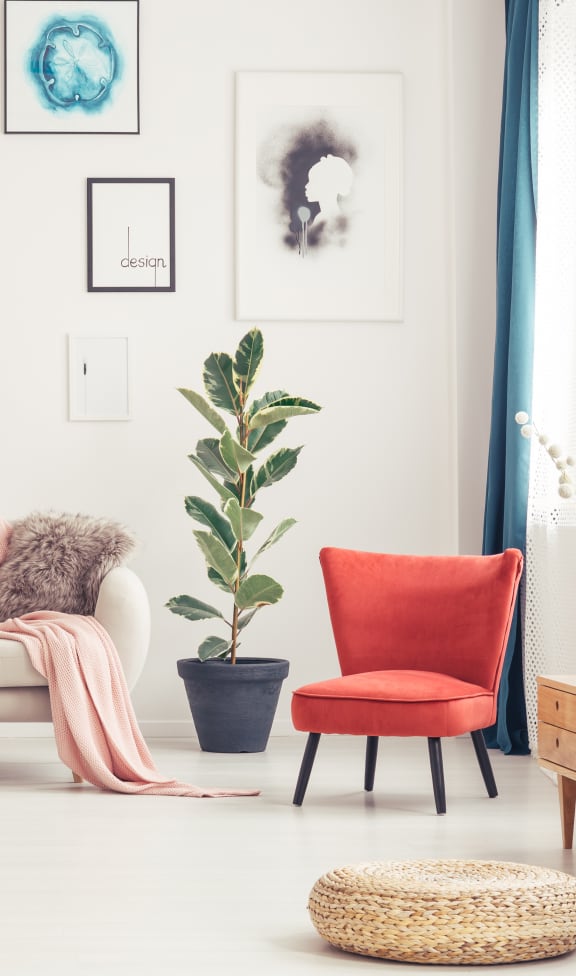 a living room with a couch and a chair