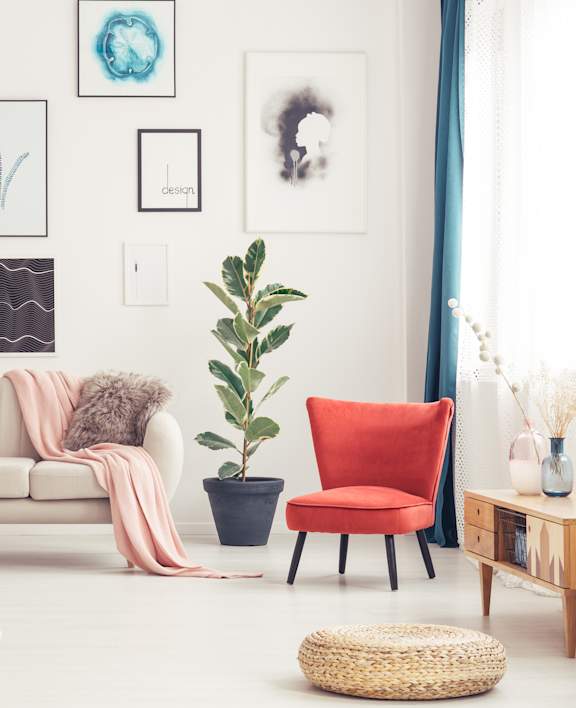 a living room with a couch and a chair