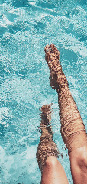 Dipping Toes in Swimming Pool at The Monterey Apartments in San Jose, CA