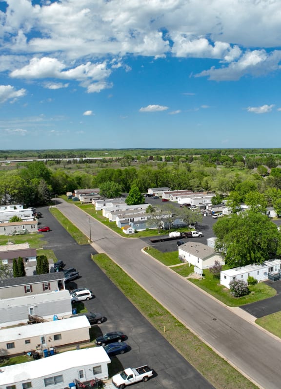 an aerial view of an rv park in a parking lot