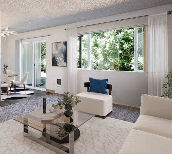 a living room with a white couch and a table