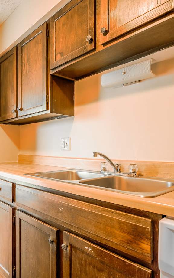 A washing machine is installed in a bathroom.