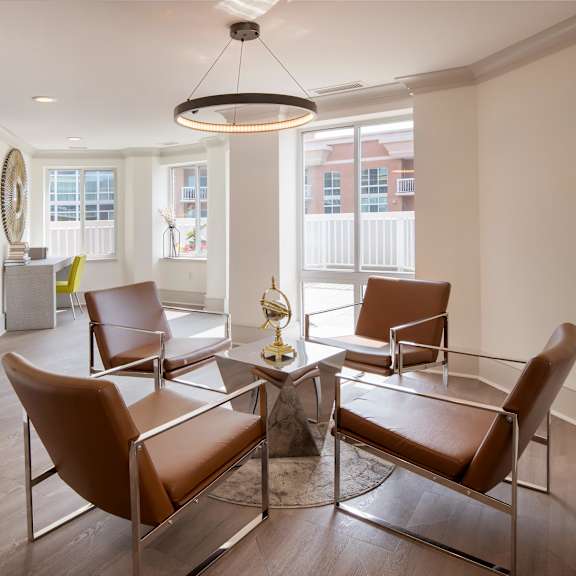 the lobby of the resource center with chairs and tables