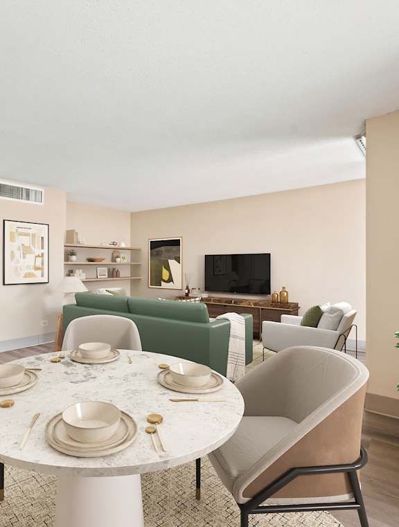 A dining room with a table set for two and a potted plant on the side table.