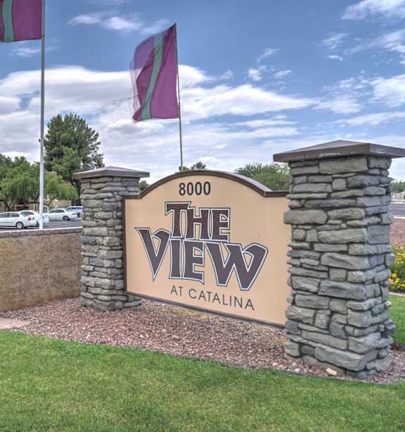 The entrance to The View at Catalina with a flag flying in the background.