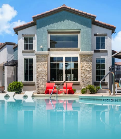 Resident pool and hot tub with lounge seating at Miro at the Parc, Henderson, Nevada