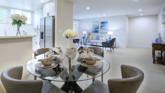 a kitchen and dining area in a 555 waverly unit
