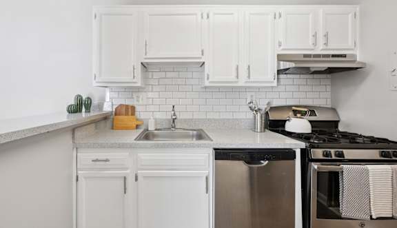 Kitchen with wooden cabinets at ReNew Odenton, Odenton, Maryland
