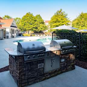 Gas Grills at Pool at One Rocky Ridge Apartment Homes in Douglasville, GA