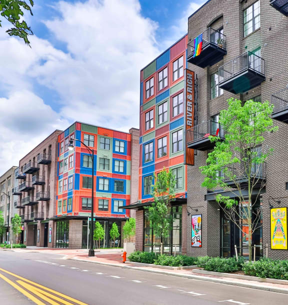 a rendering of a building on a city street