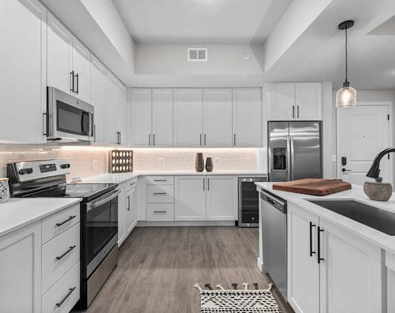 Fully-equipped kitchens with stainless steel appliances
