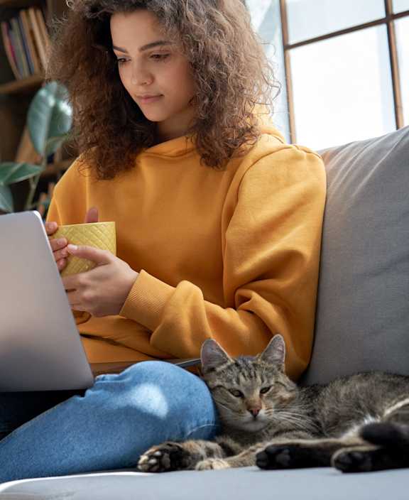 stock photo happy couple with a dog in their new home