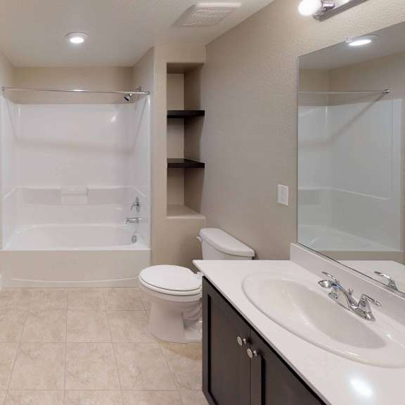 a bathroom with a shower toilet and sink at Edgewater, Pittsburg, CA 94565