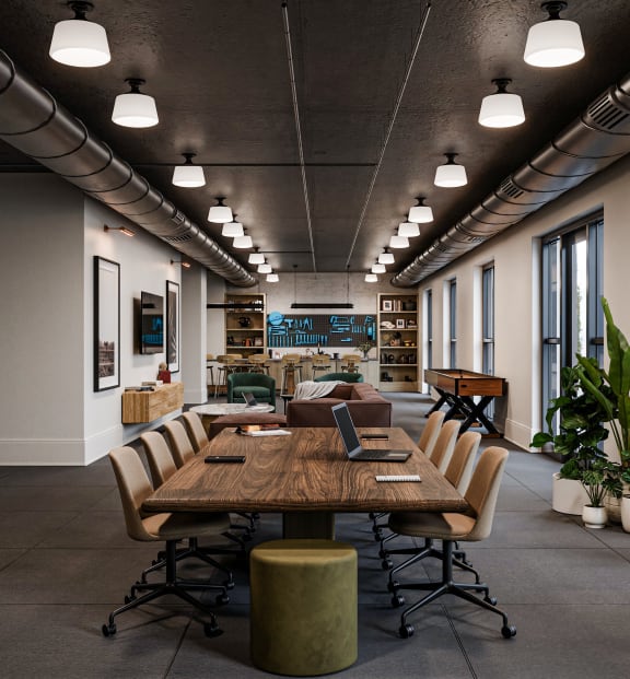 a large conference room with tables and chairs and large windows at La Unión, Tampa, FL
