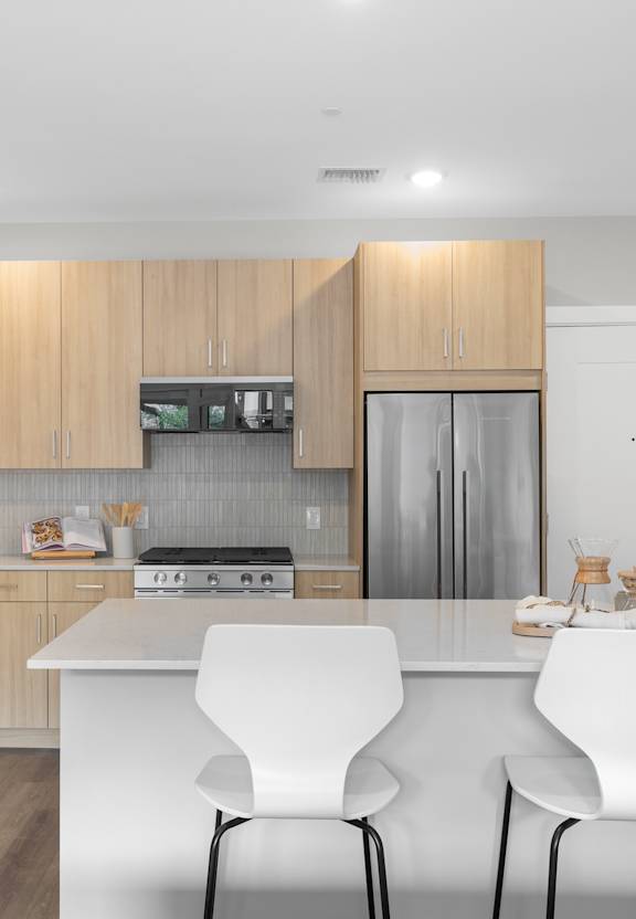 Kitchen with counter and chairs at The Lawrence, New Jersey