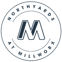 A logo with a large letter M in the center and the words