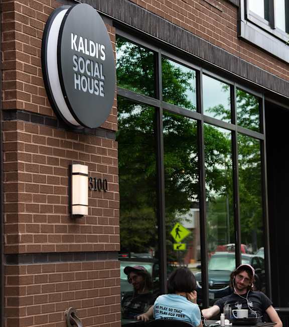 A brick building with a sign that says Kaldi's Social House.