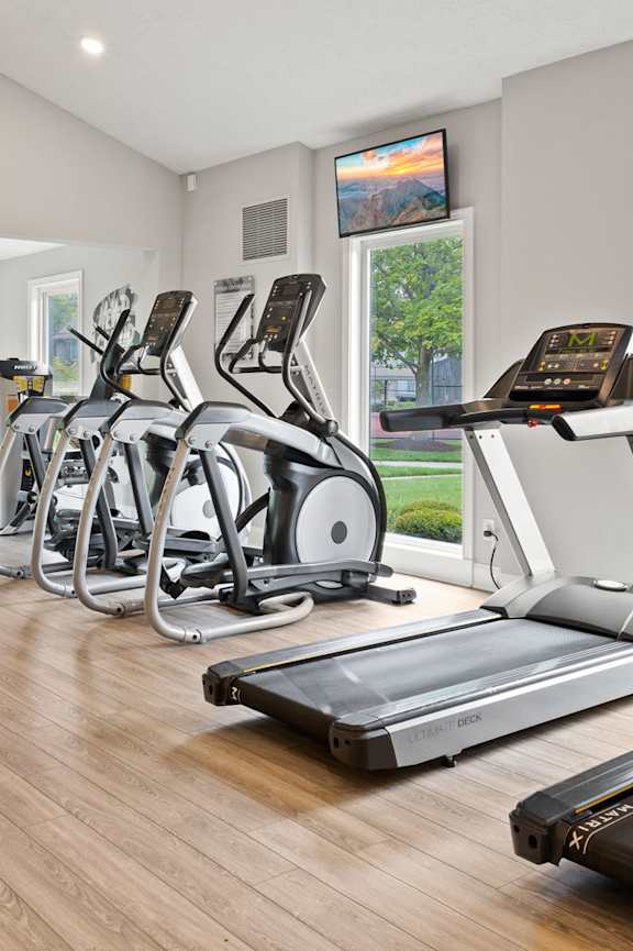 Gym with a variety of equipment at Lakes of Carmel Apartments, Indiana