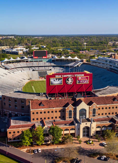 An aerial view of a stadium with a red banner that reads "SEC Championship".