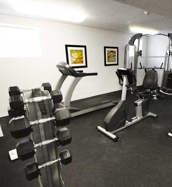 a room filled with lots of exercise equipment