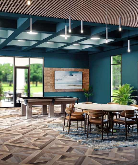 A modern dining room with a large table and chairs at Stillwater Lakes Apartments, Florida 34744