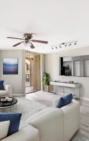 a living room with couches and a coffee table